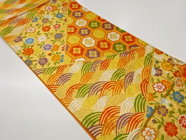 切り嵌め風枝垂れ桜に花菱亀甲・荒波模様織出し袋帯